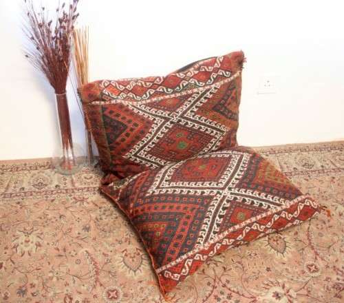A stunning top-quality colourful hand made Persian camel saddle back double cushion.