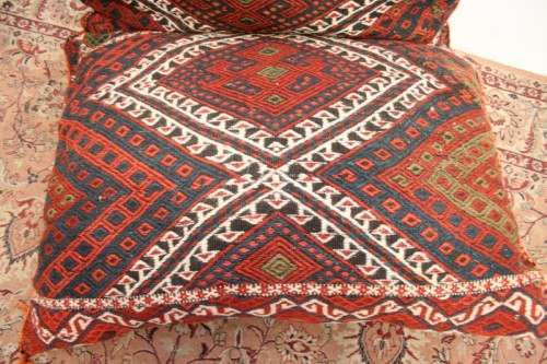 A stunning top-quality colourful hand made Persian camel saddle back double cushion.