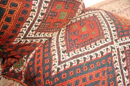 A stunning top-quality colourful hand made Persian camel saddle back double cushion.
