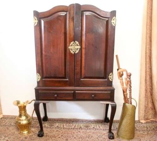 A stunning vintage Imbuia ball & claw drinks cabinet with two drawers, pull out server and shelves