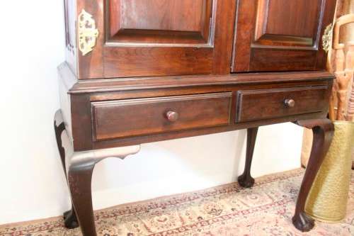 A stunning vintage Imbuia ball & claw drinks cabinet with two drawers, pull out server and shelves