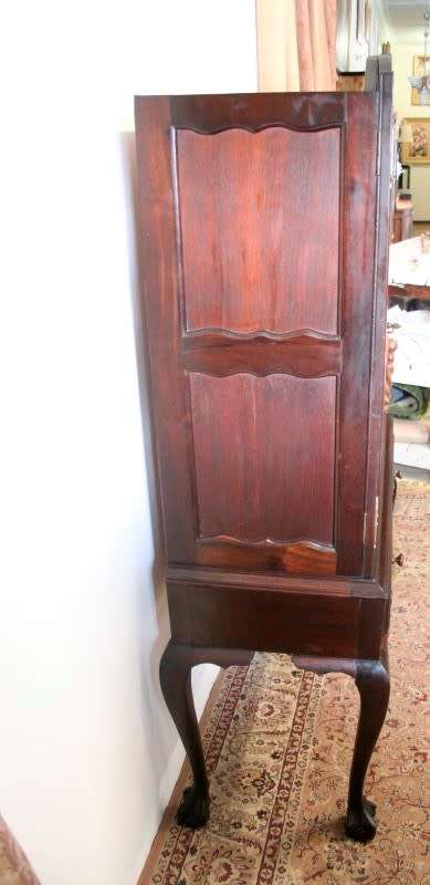 A stunning vintage Imbuia ball & claw drinks cabinet with two drawers, pull out server and shelves