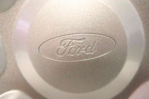 A fantastic set of Ford hubcaps in excellent condition.