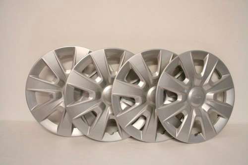 A fantastic set of Ford hubcaps in excellent condition.