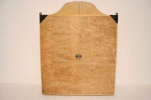 A top quality Unicorn (Phil Taylor)dart board in a wooden cabinet w score boards in super condition.