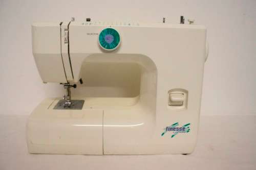 A vintage Janome "Finesse" model JFS1812 sewing machine.