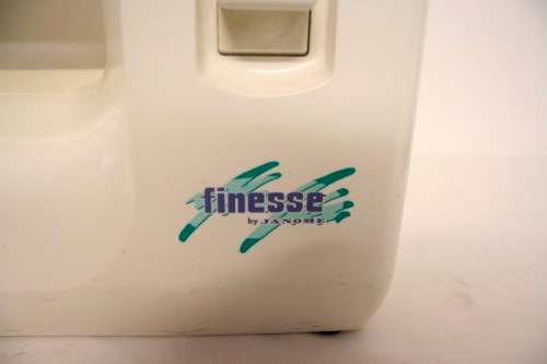 A vintage Janome "Finesse" model JFS1812 sewing machine.
