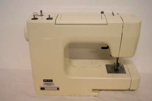 A vintage Janome "Finesse" model JFS1812 sewing machine.