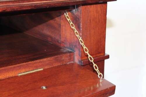 An incredible stylish "Benchmark Wood Classics" one-drawer Mahogany console table w fall-down door