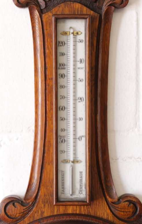 An incredible (large) antique (c1926) hand carved enamel-face wall Barometer and thermometer