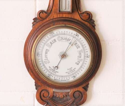 An incredible (large) antique (c1926) hand carved enamel-face wall Barometer and thermometer