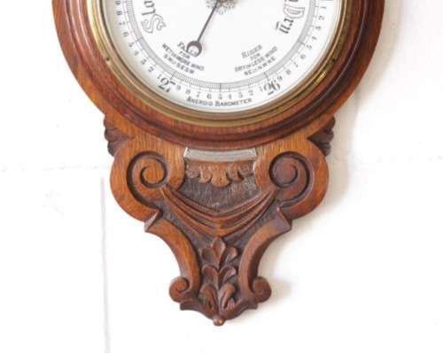 An incredible (large) antique (c1926) hand carved enamel-face wall Barometer and thermometer