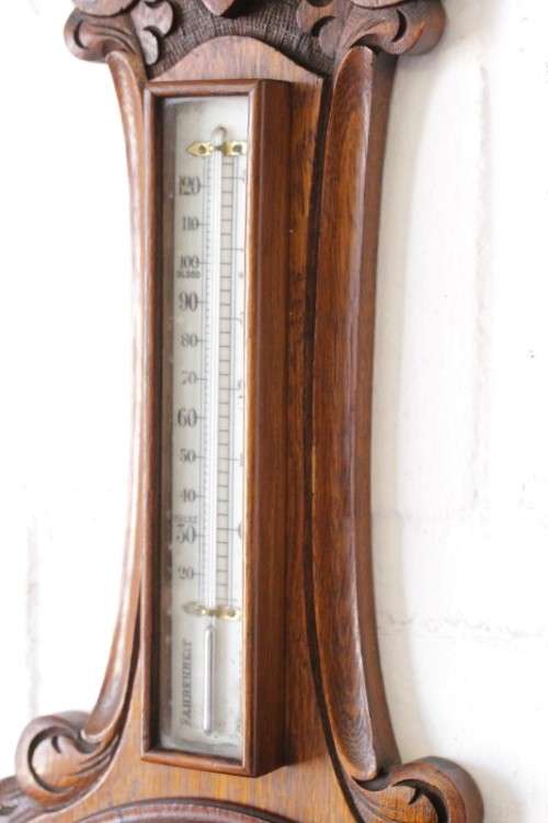 An incredible (large) antique (c1926) hand carved enamel-face wall Barometer and thermometer