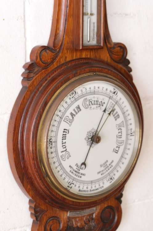 An incredible (large) antique (c1926) hand carved enamel-face wall Barometer and thermometer