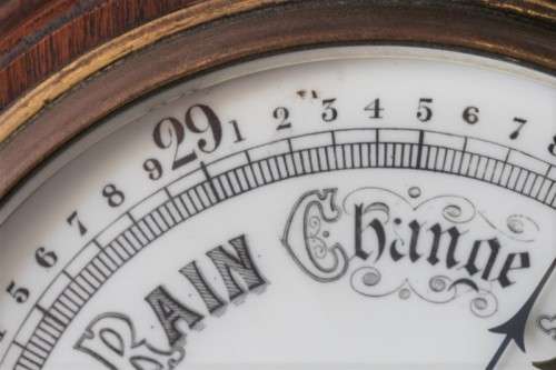 An incredible (large) antique (c1926) hand carved enamel-face wall Barometer and thermometer