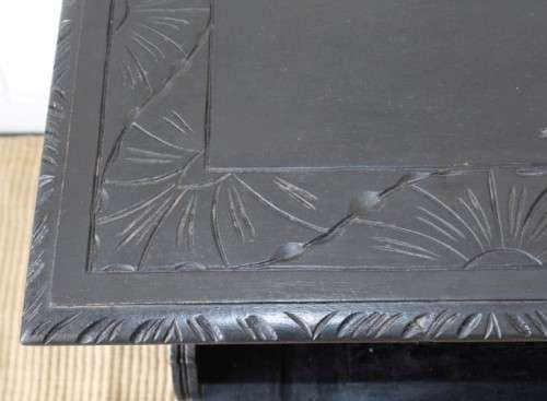 A superb antique hand-carved blackened oak monks bench with a storage chest in the base