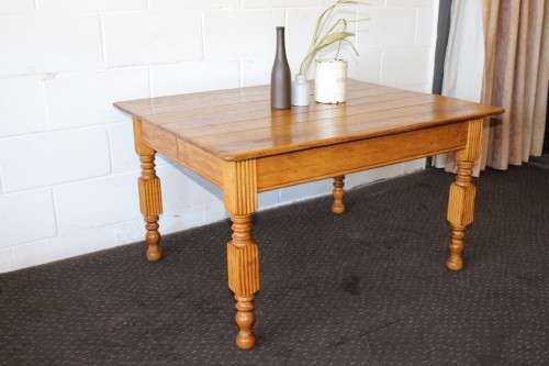 A lovely solid Oak center coffee table with turned legs and uncomplicated design - stunning!!