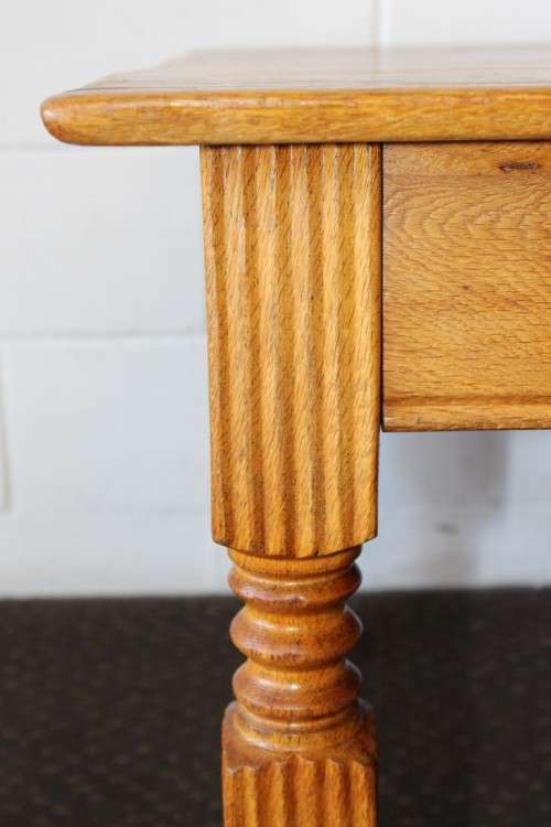 A lovely solid Oak center coffee table with turned legs and uncomplicated design - stunning!!