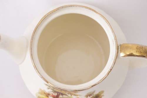 A gorgeous vintage Alfred Meakin ivory-porcelain 4-cup teapot with beautiful country scene detailing