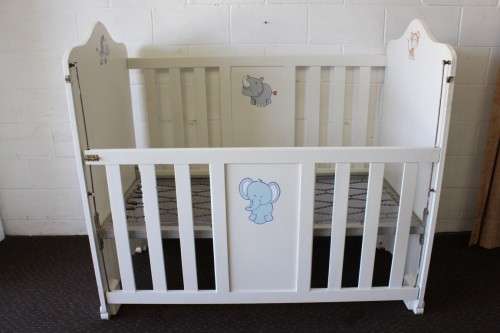 **RS17_Clearance** Awesome white baby's cot with a drop-side and a mattress - perfect for nursery!!