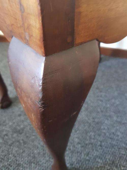 A beautiful and elegant vintage solid imbuia piano stool/ bench with carved ball and claw feet.
