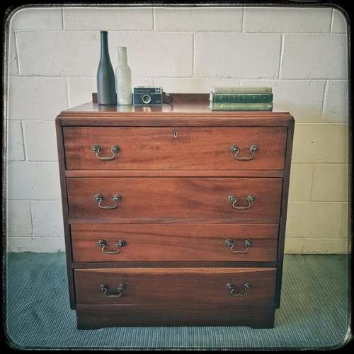A beautiful vintage Teak 4-drawer chest of drawers w/ gorgeous period style handles