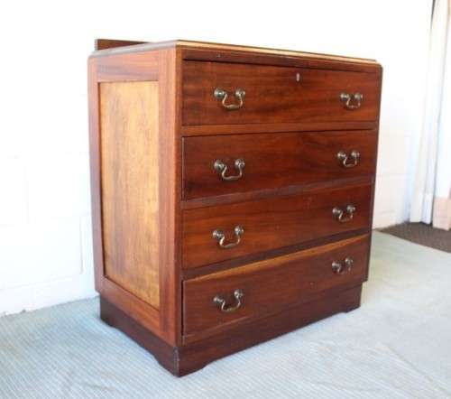 A beautiful vintage Teak 4-drawer chest of drawers w/ gorgeous period style handles