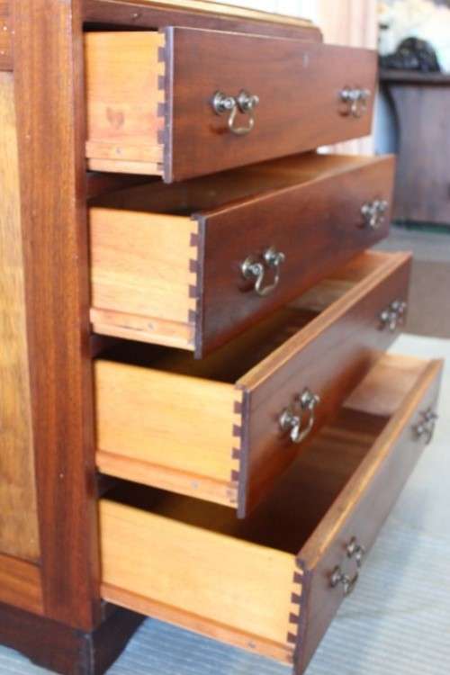 A beautiful vintage Teak 4-drawer chest of drawers w/ gorgeous period style handles