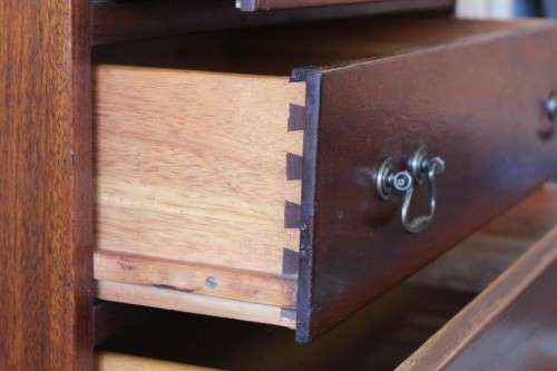 A beautiful vintage Teak 4-drawer chest of drawers w/ gorgeous period style handles