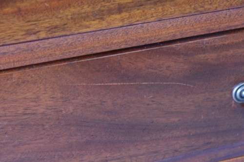 A beautiful vintage Teak 4-drawer chest of drawers w/ gorgeous period style handles