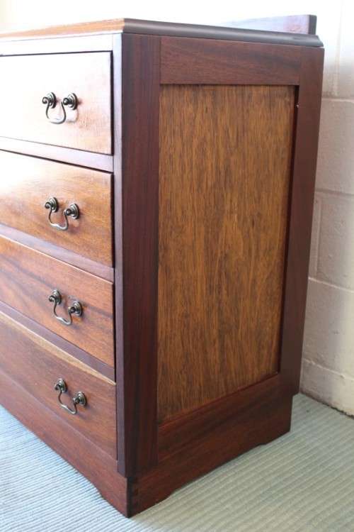 A beautiful vintage Teak 4-drawer chest of drawers w/ gorgeous period style handles