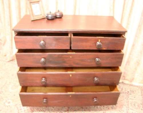 **RS17** A stylish vintage Teak 5-drawer (two over three) chest of drawers with round wood handles