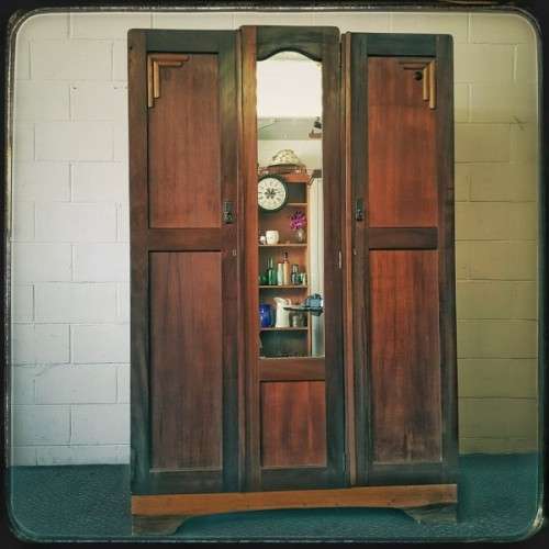An awesome vintage three-door, two division wardrobe w/ a "full-length" centre mirror & ample space