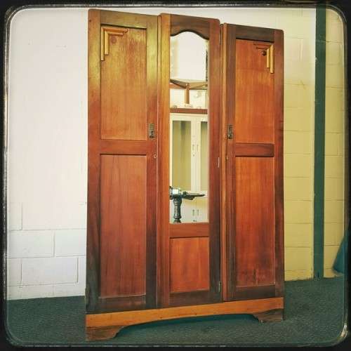 An awesome vintage three-door, two division wardrobe w/ a "full-length" centre mirror & ample space