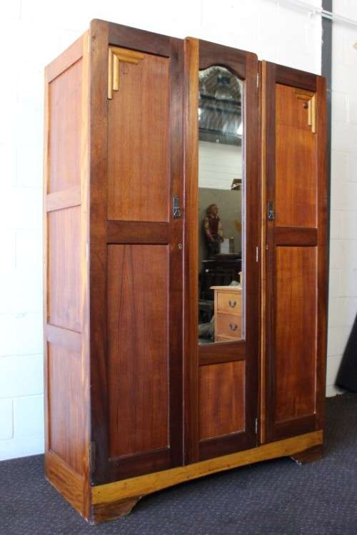 An awesome vintage three-door, two division wardrobe w/ a "full-length" centre mirror & ample space