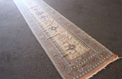 A beautiful long (4 meter) traditional Turkish Qashqai tribal "runner" Persian carpet w/ deer motifs
