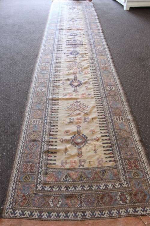 A beautiful long (4 meter) traditional Turkish Qashqai tribal "runner" Persian carpet w/ deer motifs