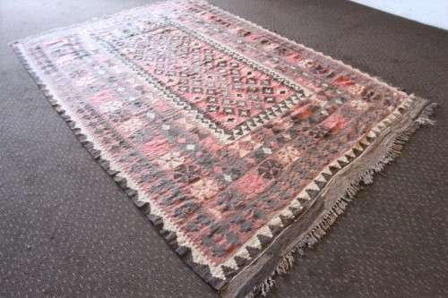 **RS17** A traditional Turkish Kilim carpet w/ beautiful motifs in rust, ivory, black & earthy hues