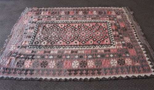 **RS17** A traditional Turkish Kilim carpet w/ beautiful motifs in rust, ivory, black & earthy hues
