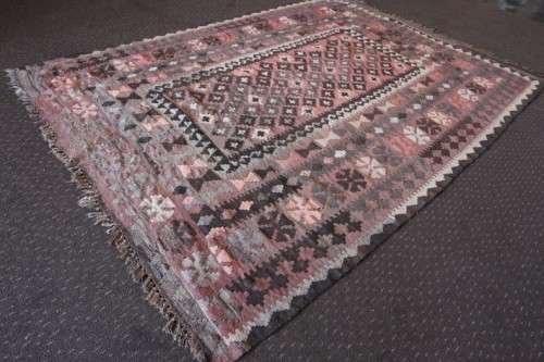 **RS17** A traditional Turkish Kilim carpet w/ beautiful motifs in rust, ivory, black & earthy hues