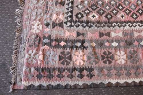 **RS17** A traditional Turkish Kilim carpet w/ beautiful motifs in rust, ivory, black & earthy hues