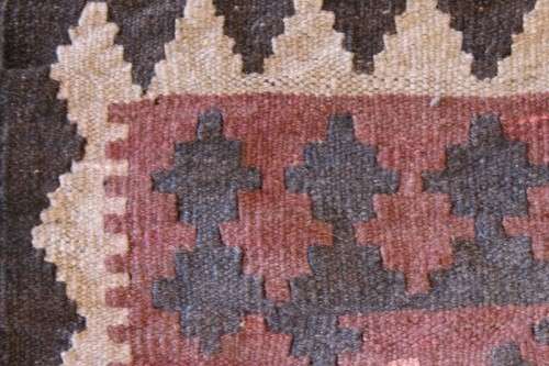 **RS17** A traditional Turkish Kilim carpet w/ beautiful motifs in rust, ivory, black & earthy hues