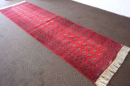 Spectacular long (3m) traditional red Pakistani Bokhara Persian runner carpet in fabulous condition