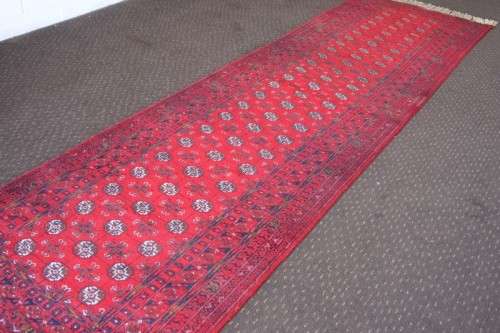 Spectacular long (3m) traditional red Pakistani Bokhara Persian runner carpet in fabulous condition