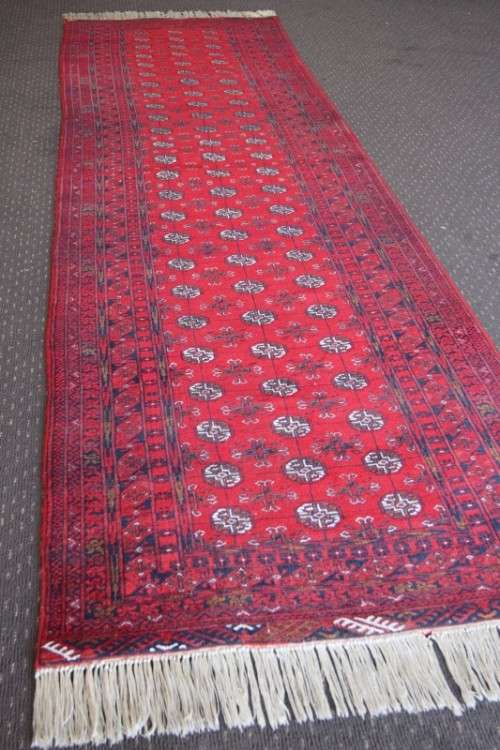 Spectacular long (3m) traditional red Pakistani Bokhara Persian runner carpet in fabulous condition
