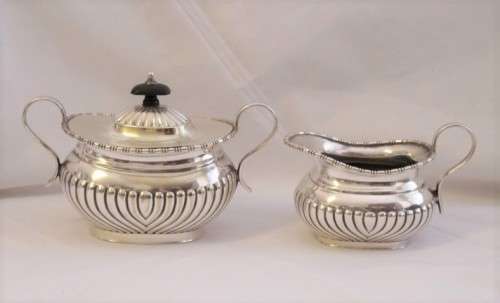 A beautiful antique silver plated tea set incl. 6-cup teapot and coffee pot, sugar bowl & creamer