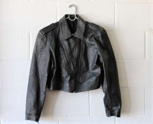 A stunning and very stylish black genuine ostrich skin leather ladies (size medium) bomber jacket
