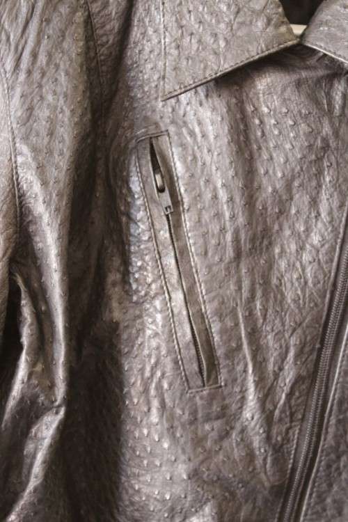 A stunning and very stylish black genuine ostrich skin leather ladies (size medium) bomber jacket