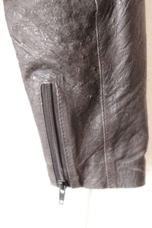 A stunning and very stylish black genuine ostrich skin leather ladies (size medium) bomber jacket