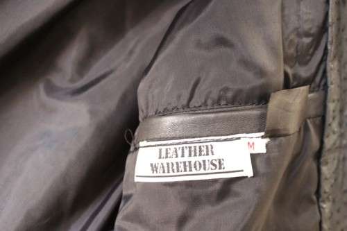 A stunning and very stylish black genuine ostrich skin leather ladies (size medium) bomber jacket